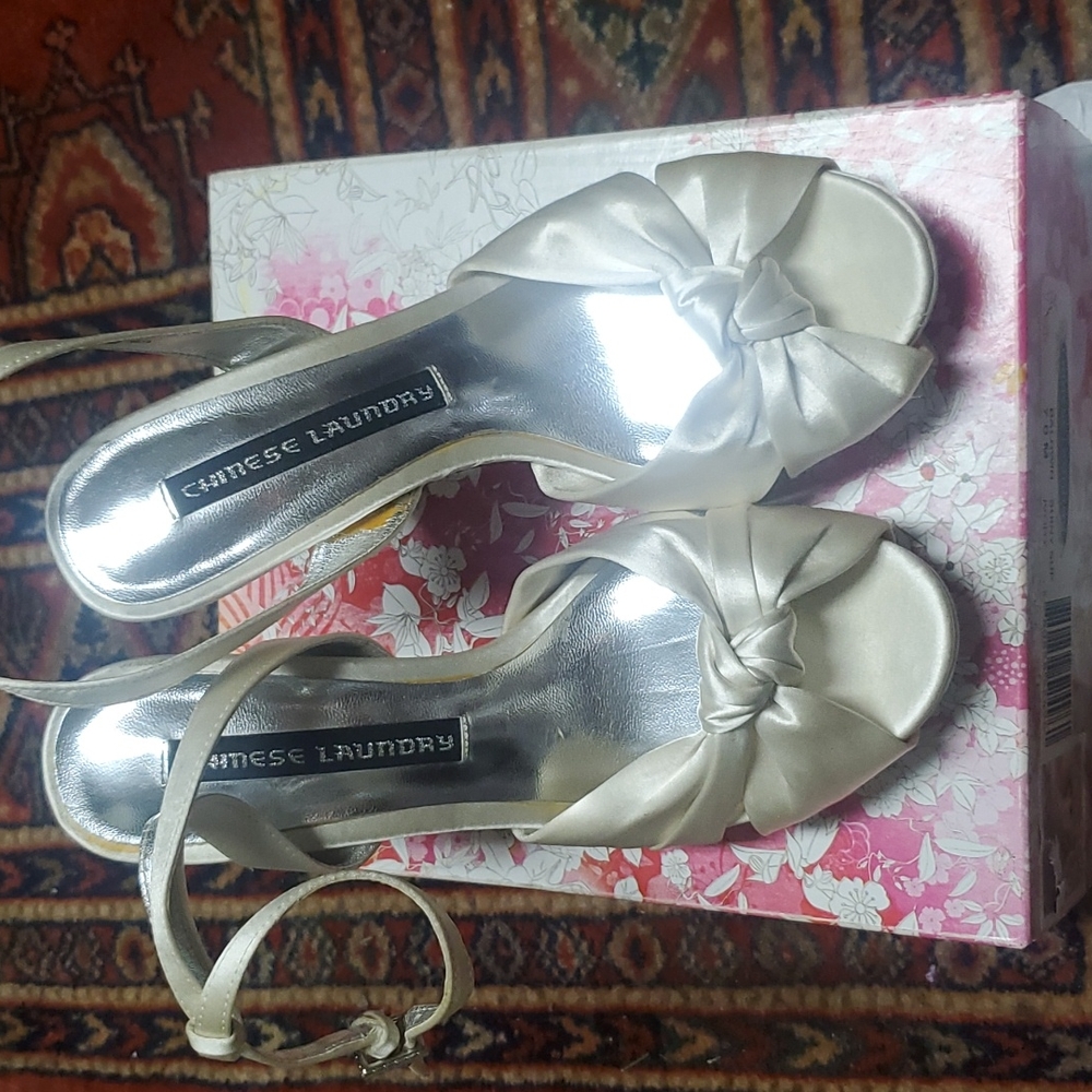 Ivory satin heels size 7 by Chinese Laundry